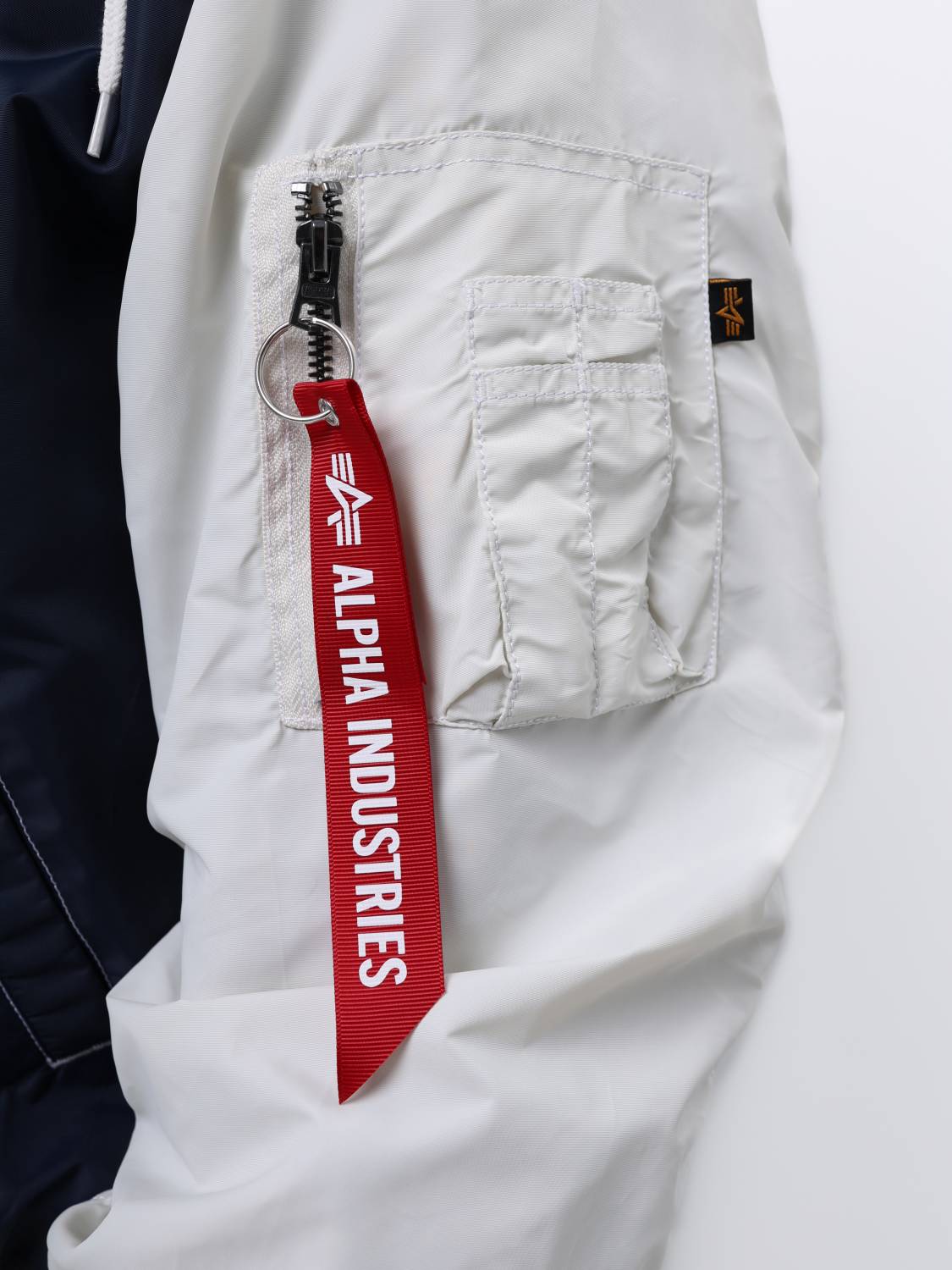 Куртка / Ветровка / Бомбер мужской "L-2B Hooded Relaxed Varsity" (Replica Blue) Alpha Industries Куртка / Ветровка / Бомбер мужской "L-2B Hooded Relaxed Varsity" (Replica Blue) Alpha Industries